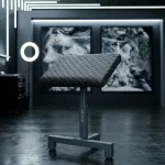 Gestepptes Tattoo-Armstütze (mit T-Fuß, schwarz) – hydraulisch verstellbar